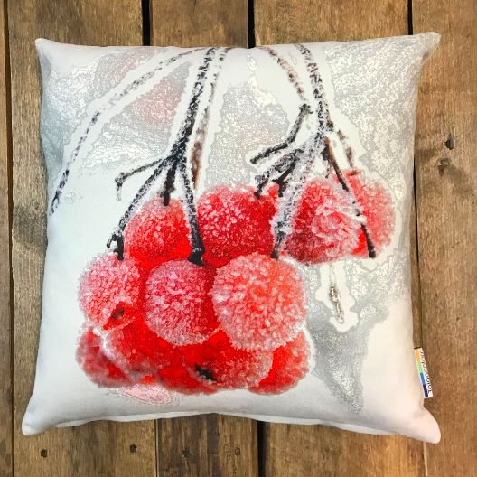 Taiga Colors cushion with red frozen rowanberries